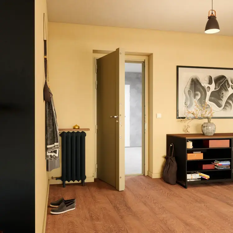 Porte blindée Adélaïde de Picard Serrures installée dans un couloir d’appartement