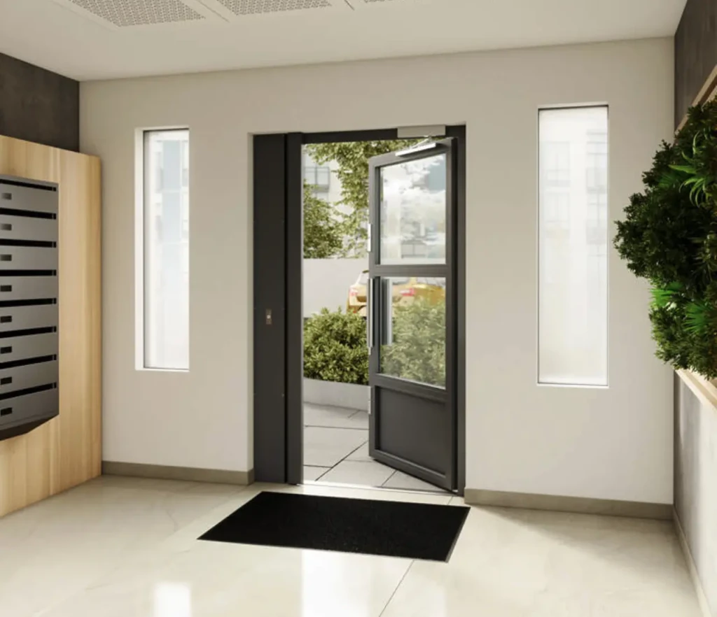 Porte Hall 2 Hall d’immeuble équipé d’une porte Rhéa Évolution vitrée